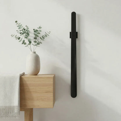 Skivax™ – Calzascarpe magnetico murale